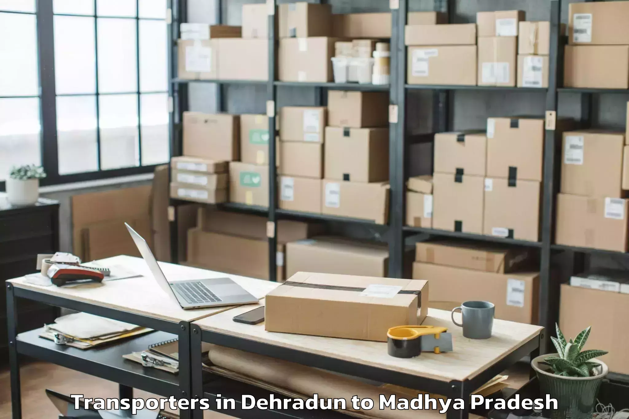 Top Dehradun to Dewas Transporters Available